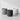 Three textured cylindrical planters in light gray, dark charcoal gray, and off-white, arranged on a light gray surface against a white background.
