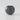 A matte dark gray spherical planter pot on a light gray reflective studio surface.