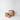 Three matte terracotta-colored fiberglass planter pots in graduated sizes, arranged on a clean white studio background.