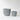 Two gray stone planters in different sizes with a textured finish and horizontal ridged detailing near the rims, set against a plain light gray background.